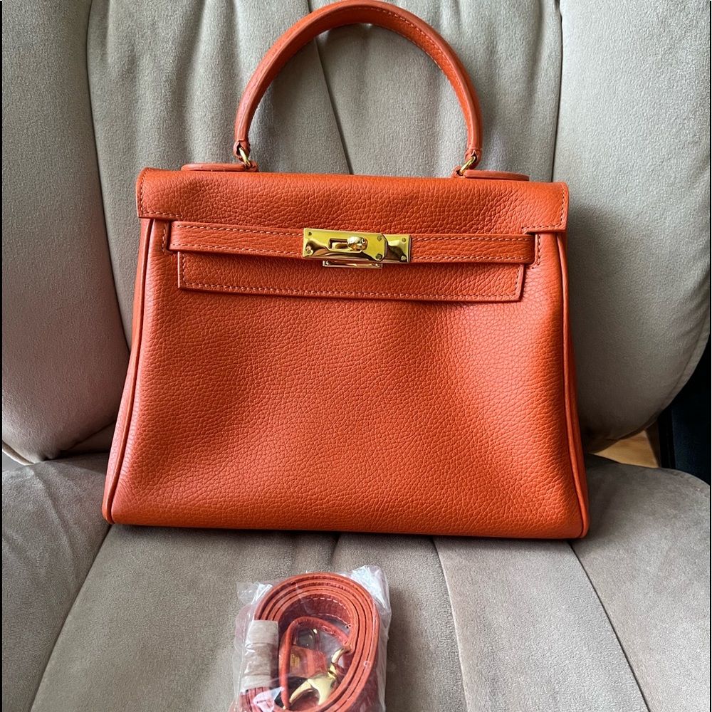 Structured Orange Buti Leather Top-Handle Crossbody Bag with Gold Hardware